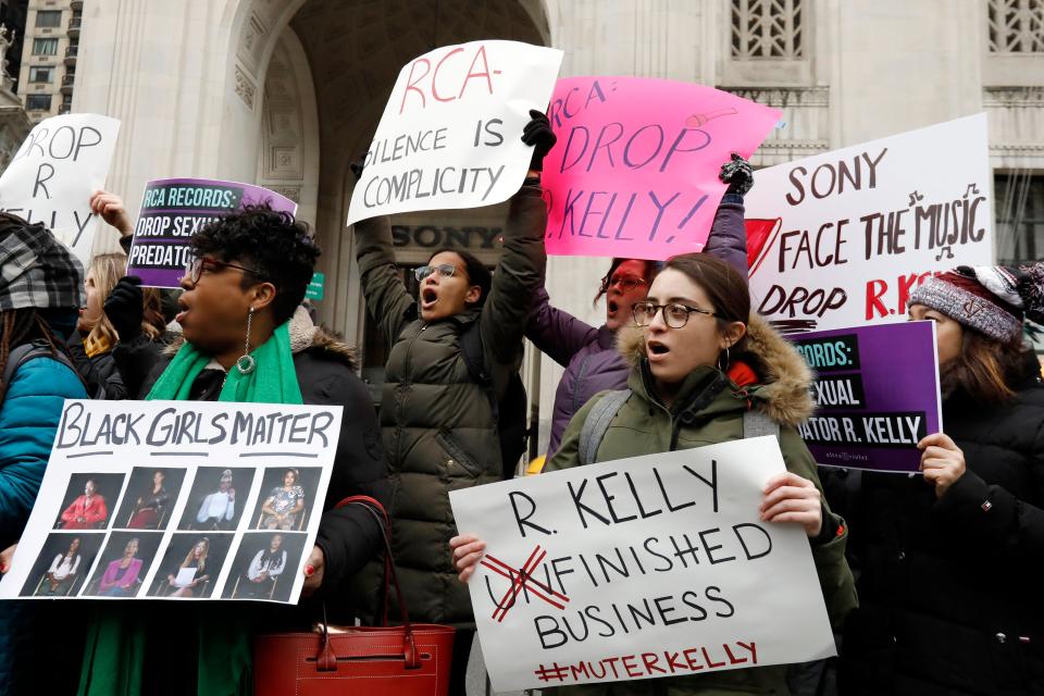Demonstrators chant during an R. Kelly protest outside Sony headquarters in New York in 2019.