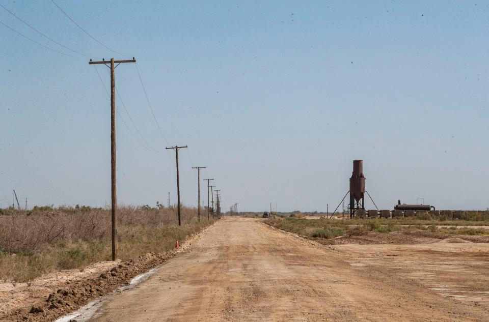 An unpaved length of Davis Road is seen in Calipatria, Calif., Wednesday, May 18, 2022.