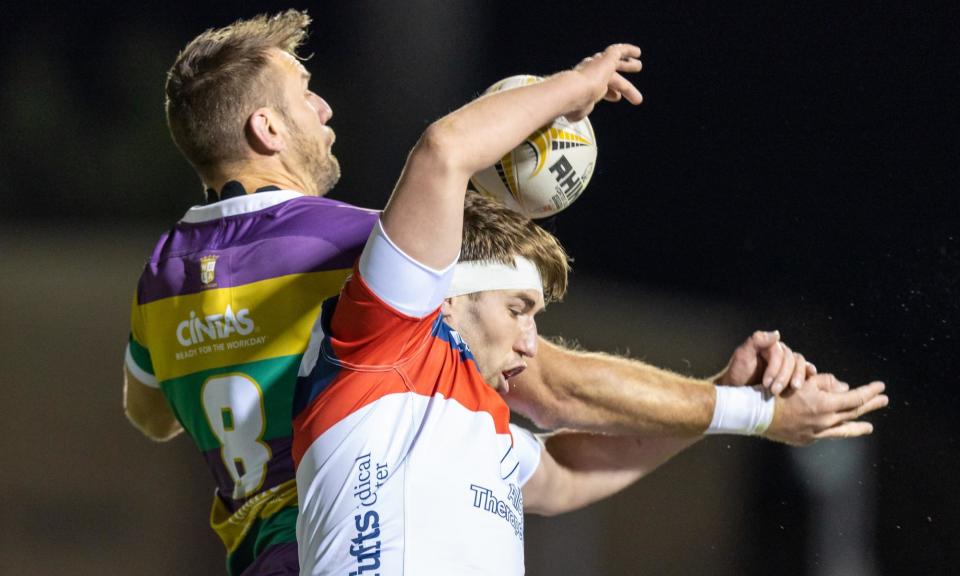 <span>The New England Free Jacks, in white, contest a lineout with the NOLA Gold, in February 2023.</span><span>Photograph: Stephen Lew/USA Today Sports</span>