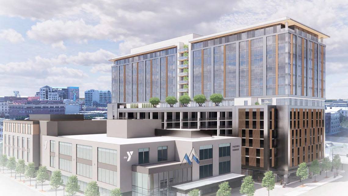 This architectural rendering shows the proposed new downtown YMCA at left, and a 15-story residential and commercial building next door.