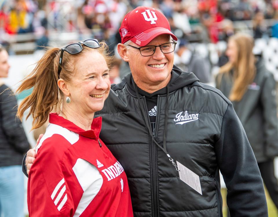 Indiana football head coach Tom Allen poses with a fan before the 72nd running of the Little 500 men’s race at Bill Armstrong Stadium on Saturday, April 22, 2023.<br>Little 500 Mens Tom Allen