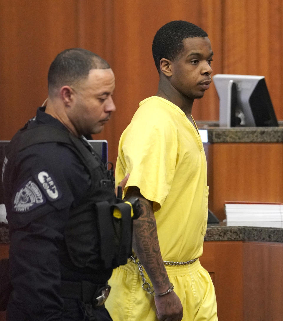 Larry D. Woodruffe, right, is escorted from the courtroom after a hearing Thursday, Jan. 10, 2019, in Houston. Woodruffe is charged with capital murder in the Dec. 30, 2018 slaying of 7-year-old Jazmine Barnes. (AP Photo/David J. Phillip)