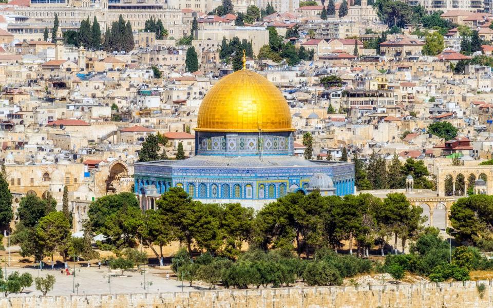 Jerusalem's blue and gold Dome of the Rock  - Piero M. Bianchi/Moment RF