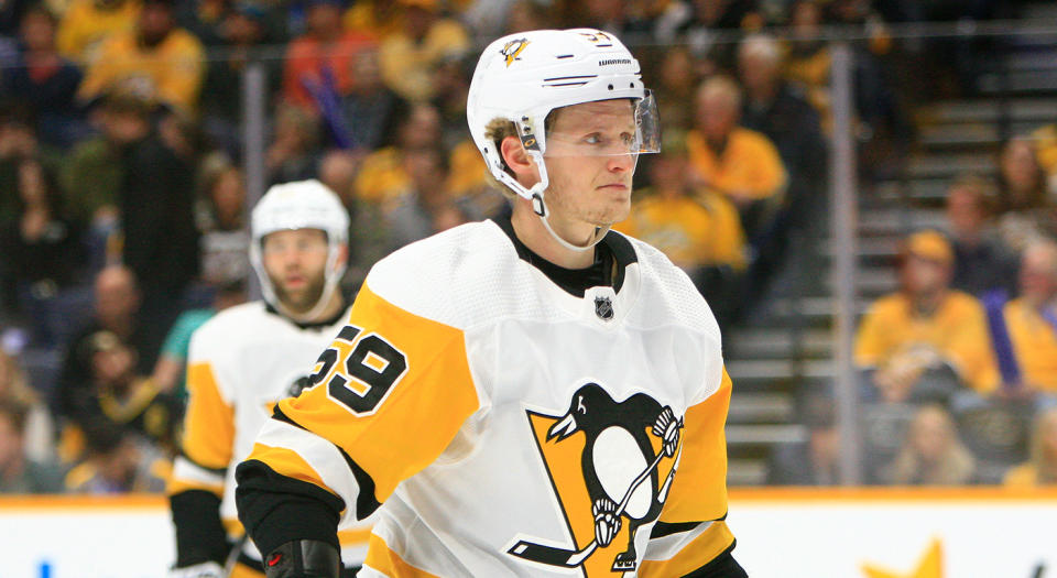 NASHVILLE, TN - DECEMBER 27: Pittsburgh Penguins left wing Jake Guentzel (59) is shown during the NHL game between the Nashville Predators and Pittsburgh Penguins, held on December 27, 2019, at Bridgestone Arena in Nashville, Tennessee. (Photo by Danny Murphy/Icon Sportswire via Getty Images) 