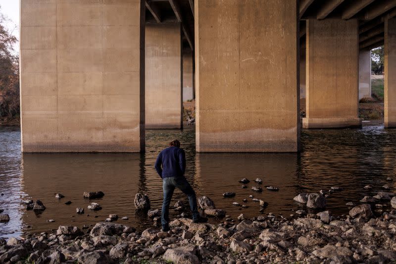 C poses for a portrait at a state park in Sacramento, California