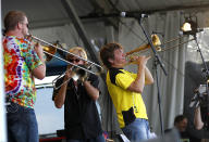 Bonerama performs at the New Orleans Jazz and Heritage Festival in New Orleans, Friday, May 4, 2012. (AP Photo/Gerald Herbert)