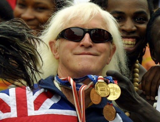 Disgraced television star Jimmy Savile, seen here in 2002, is alleged to abused up to 300 people. British Prime Minister David Cameron has warned against a "witch-hunt" of gay people after he was given a list of alleged child sex abuse suspects on live television