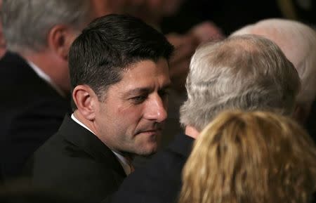 U.S. Speaker of the House Paul Ryan (L) talks with U.S. Senate Majority Leader Mitch McConnell (R) as they wait to hear U.S. President Donald Trump's announcement of his nominee for the empty associate justice seat at the U.S. Supreme Court, at the White House in Washington, D.C., U.S. January 31, 2017. REUTERS/Carlos Barria