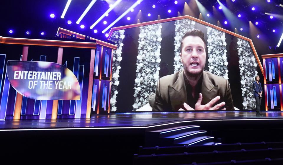 Luke Bryan appears on screen accepting the award for entertainer of the year at the 56th annual Academy of Country Music Awards on Sunday, April 18, 2021, at the Grand Ole Opry in Nashville, Tenn. (AP Photo/Mark Humphrey)