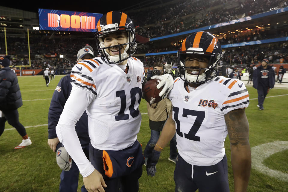 Chicago Bears quarterback Mitchell Trubisky and wide receiver Anthony Miller (17) react following an NFL football game against the Dallas Cowboys, Thursday, Dec. 5, 2019, in Chicago. Chicago won 31-24. (AP Photo/Morry Gash)