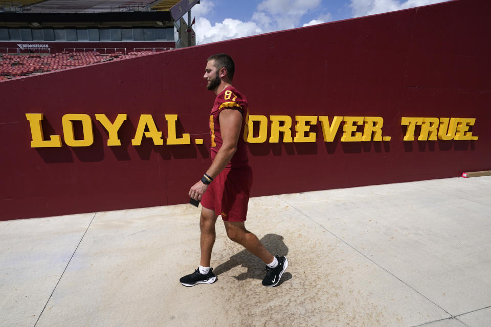 Iowa State tight end Easton Dean walks to the field during an NCAA college football media day, Friday, Aug. 4, 2023, in Ames, Iowa. (AP Photo/Charlie Neibergall)