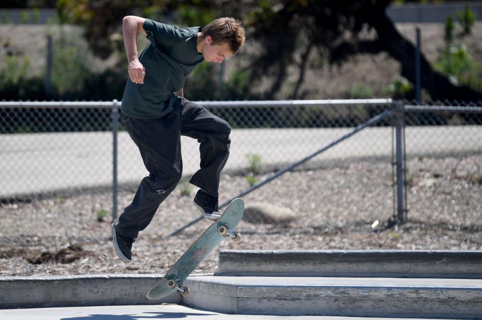 Fred Stilwell, 15, of Ventura practices some of his tricks at Avenue Skatepark at Westpark Community Park in Ventura on Thursday, July 13, 2023. 