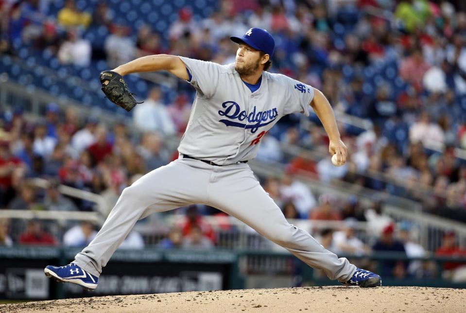 Los Angeles Dodgers pitcher Clayton Kershaw (22) throws during the third inning of a baseball game against the Washington Nationals at Nationals Park, Tuesday, May 6, 2014, in Washington. (AP Photo/Alex Brandon)