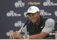 Tiger Woods of the United States speaks at a press conference ahead of the start of the British Open golf championships at Royal Portrush in Northern Ireland, Tuesday, July 16, 2019. The British Open starts Thursday. (AP Photo/Matt Dunham)