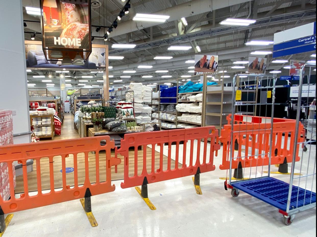 Non-essential items are blocked off in a Tesco supermarket on Western Avenue in Cardiff, Wales. (Getty Images)