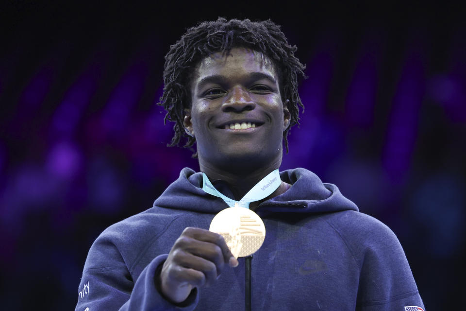 United States' Frederick Richard celebrates winning the bronze medal in the men's all-round final at the Artistic Gymnastics World Championships in Antwerp, Belgium, Thursday, Oct. 5, 2023. (AP Photo/Geert vanden Wijngaert)