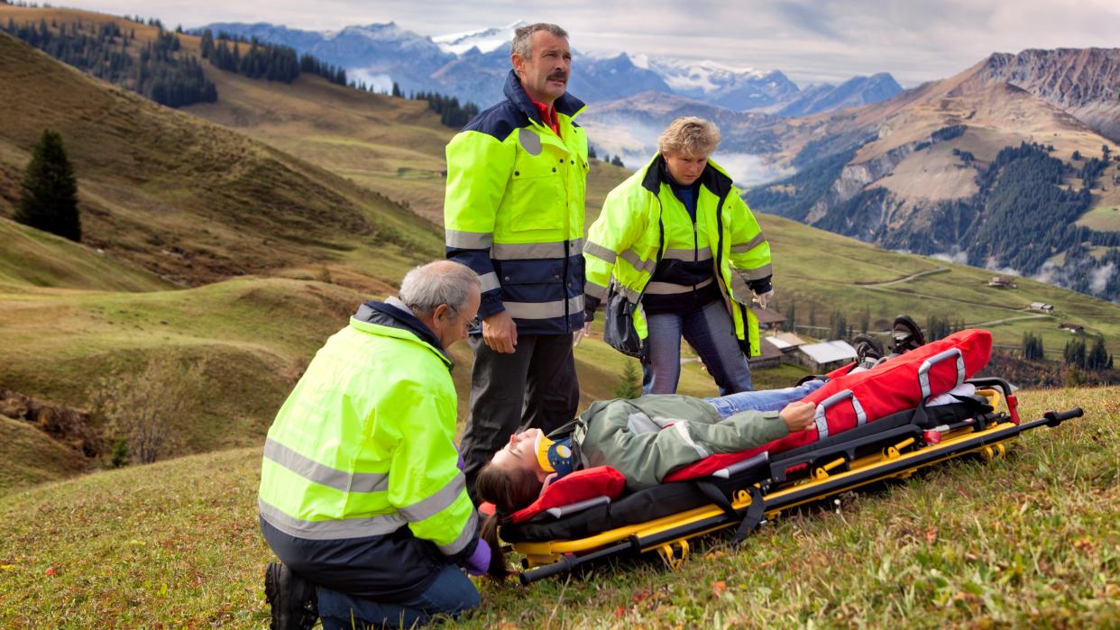  Swiss Paramedics Team Care For Injured Woman in Alps 