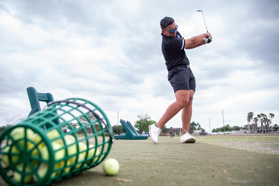 Santa Gertrudis Academy senior Sebastian Read, 18, practices at the driving range at L E Ramey Golf Course in Kingsville, Texas, on May 5, 2022. 