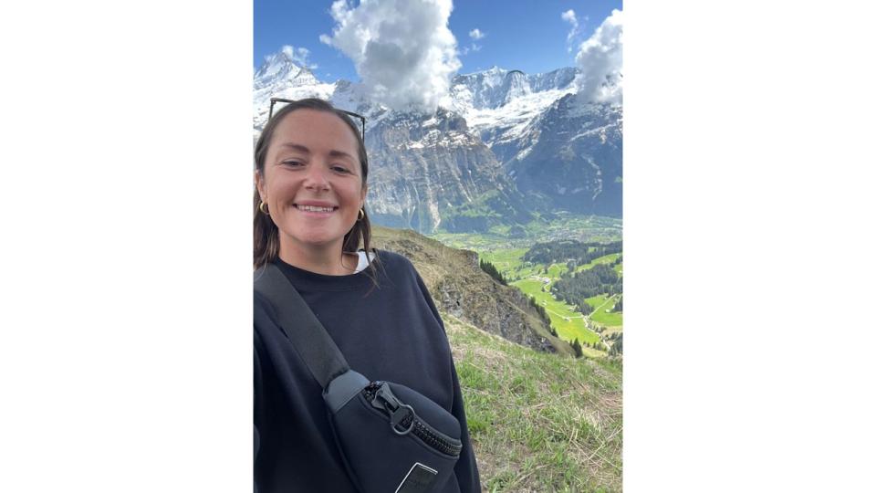 Young woman hiking in Switzerland