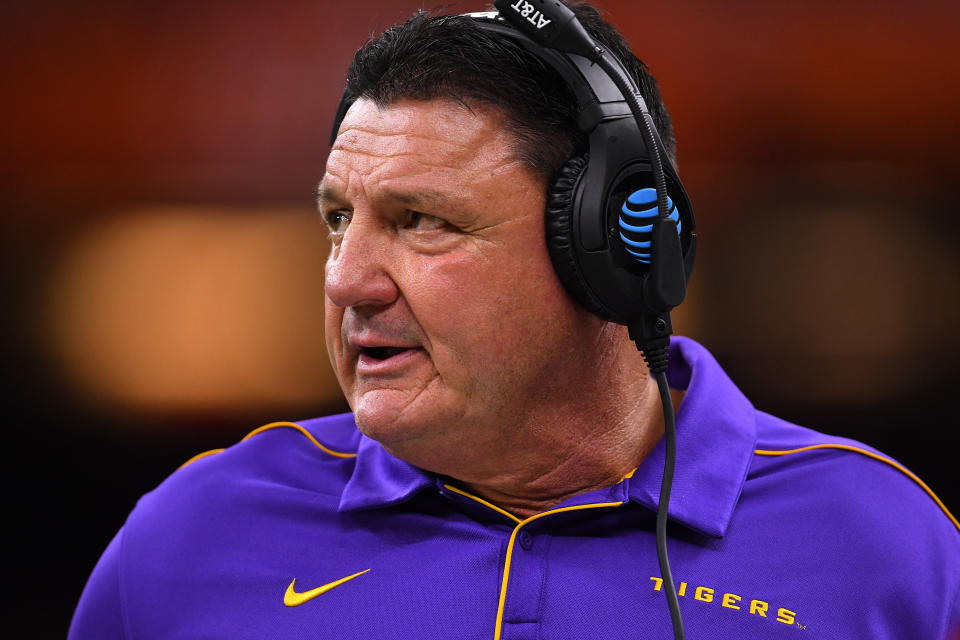 NEW ORLEANS, LA - JANUARY 13: Head Coach Ed Orgeron of the LSU Tigers coaches from the sidelines against the Clemson Tigers during the College Football Playoff National Championship held at the Mercedes-Benz Superdome on January 13, 2020 in New Orleans, Louisiana. (Photo by Jamie Schwaberow/Getty Images)