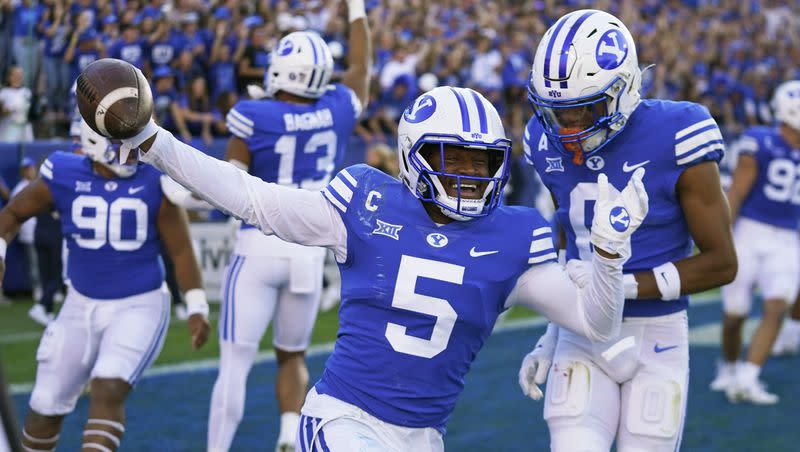 BYU cornerback Eddie Heckard (5) celebrates his fumble recovery touchdown against Texas Tech Saturday, Oct. 21, 2023, in Provo, Utah. The Weber State transfer more than lived up to the hype after arriving to Provo from the Ogden school.