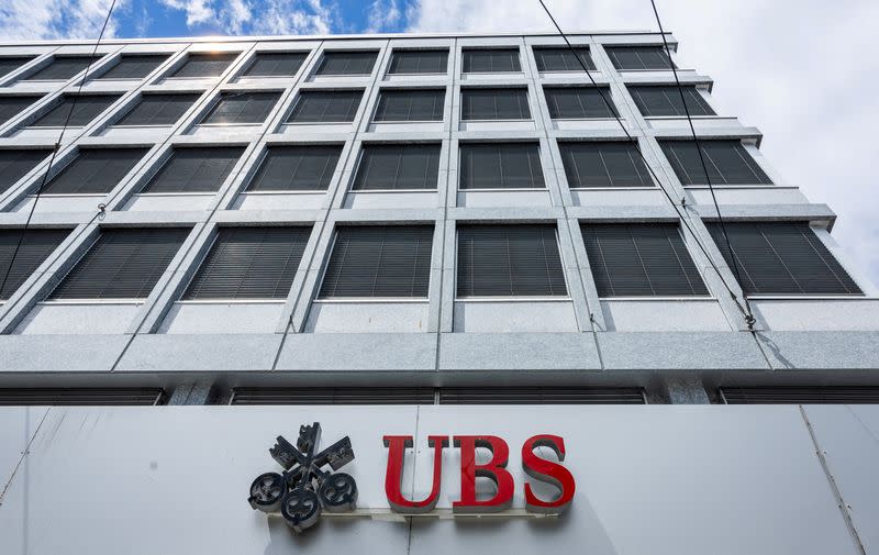 FILE PHOTO: A UBS logo is pictured on the branch of the Swiss bank in Lucerne