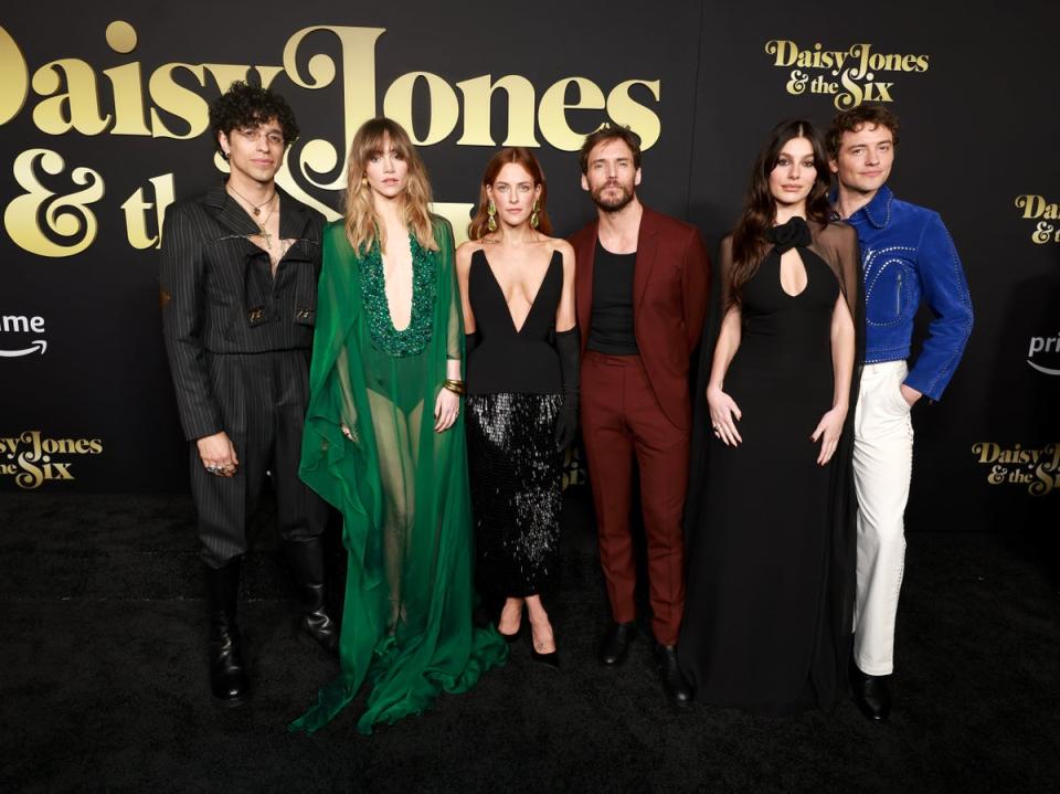 L-R) Sebastian Chacon, Suki Waterhouse, Riley Keough, Sam Claflin, Camila Morrone, and Josh Whitehouse of Daisy Jones & The Six (Getty Images for Prime Video)