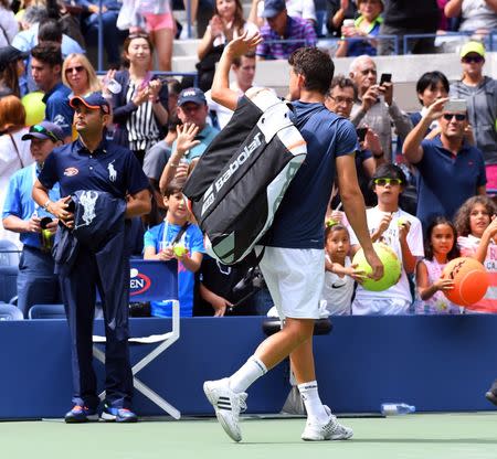 5, 2016; New York, NY, USA; Dominic Thiem of Austria retires from injury while playing Juan Martin del Potro of Argentina on day eight of the 2016 U.S. Open tennis tournament at USTA Billie Jean King National Tennis Center. Mandatory Credit: Robert Deutsch-USA TODAY Sports