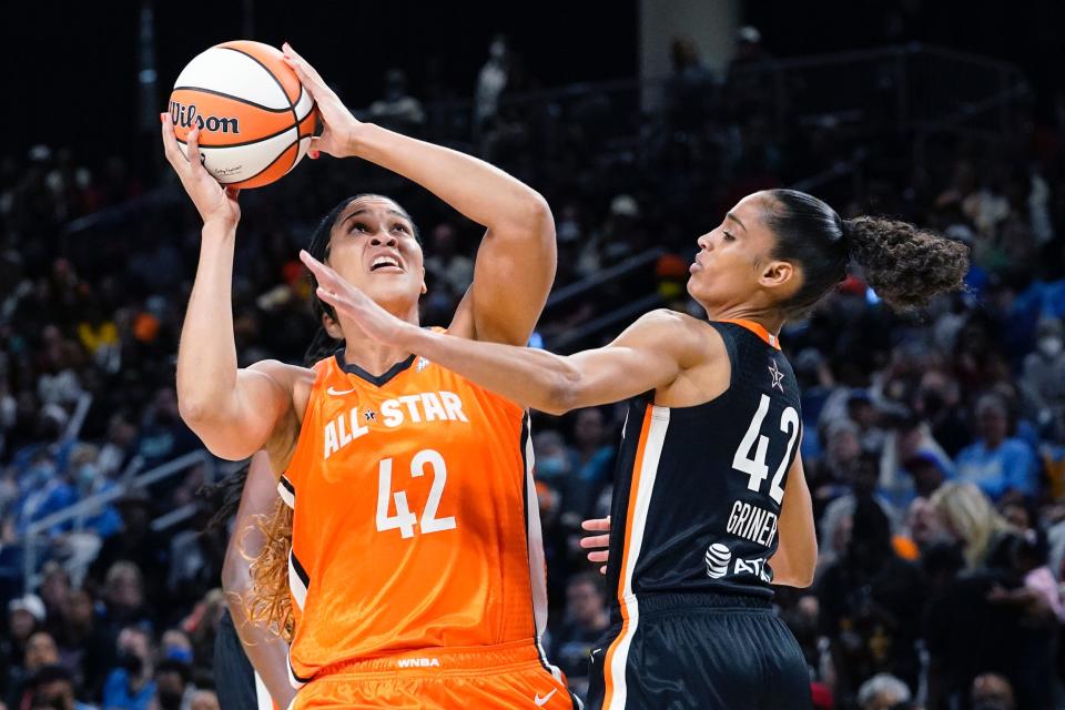 Team Wilson's Brionna Jones (left) shoots against Team Stewart's Skylar Diggins-Smith as both players wear Brittney Griner's name and number on their WNBA All-Star jerseys.