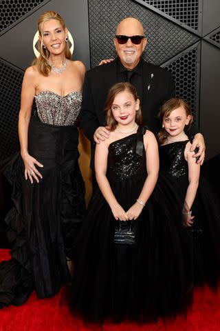 <p>Matt Winkelmeyer/Getty</p> Alexis Roderick, Billy Joel, Della Joel and Remy Joel at the 66th annual Grammys