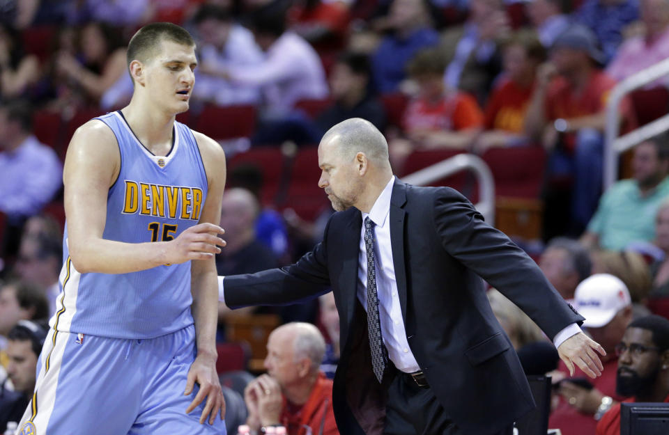 Denver Nuggets star Nikola Jokic and coach Mike Malone have a complicated relationship. (AP)