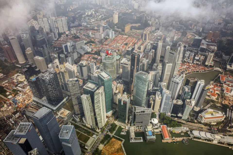 Commercial buildings in the central business district stand near Marina Bay in Singapore.  (Darren Soh/Bloomberg)