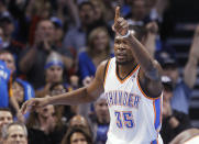 Oklahoma City Thunder forward Kevin Durant gestures following a basket in the first quarter of an NBA basketball game against the Detroit Pistons in Oklahoma City, Wednesday, April 16, 2014. (AP Photo/Sue Ogrocki)