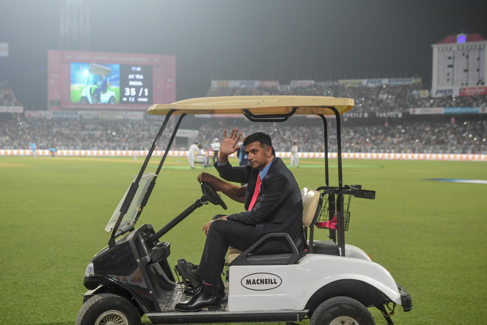 Former Indian cricket captain Rahul Dravid rides in a golf cart during a break on the first day of the second Test cricket match of a two-match series between India and Bangladesh at The Eden Gardens cricket stadium in Kolkata on November 22, 2019. (Photo by Dibyangshu SARKAR / AFP) / IMAGE RESTRICTED TO EDITORIAL USE - STRICTLY NO COMMERCIAL USE