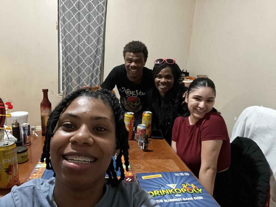 Travena Woods, left, and Robert Woods, second from left, pose for a photo with two of their sisters.