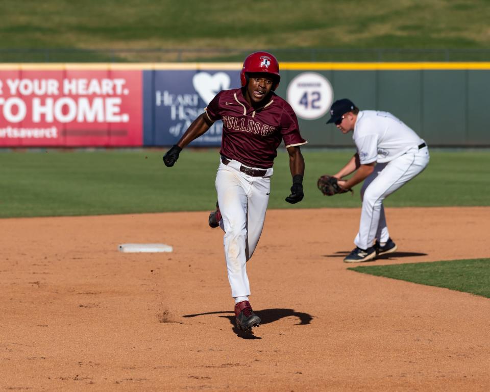 Summer Creek's Jayden Duplantier tries to stretch a double into a triple for the South team during its 7-3 win over the North at the Texas High School Baseball Coaches Association Class 5A and 6A All-Star game at Dell Diamond on Sunday. Duplantier will play for Texas next year.