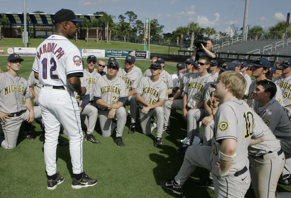 FILE - This file photo from Feb. 26, 2008, shows New York Mets manager Willie Randolph addressing Michigan's NCAA college baseball players following a baseball spring training game, in Port St. Lucie, Fla. Major League Baseball might provide scholarships and exert greater influence over Division I college baseball if a proposed partnership with the NCAA becomes reality. A spokesman for MLB, the head of the players union and the NCAA confirmed preliminary discussions have been held, most recently last month in New York. (AP Photo/Nati Harnik, FIle)