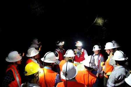 Continental Gold project workers hold a meeting inside the Continental Gold mine in Buritica