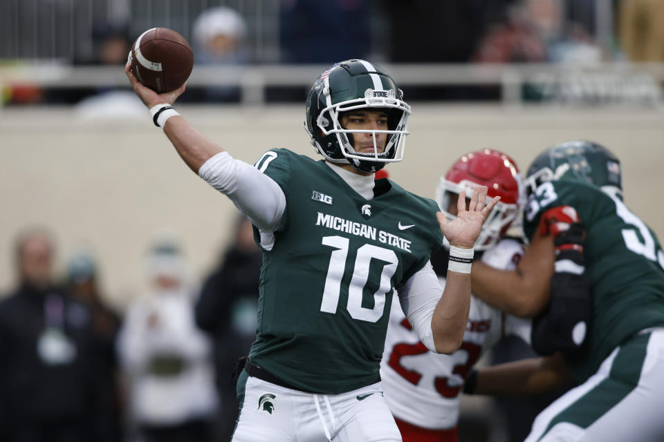 Michigan State quarterback Payton Thorne throws a pass against Rutgers during the first half of an NCAA college football game, Saturday, Nov. 12, 2022, in East Lansing, Mich. (AP Photo/Al Goldis)