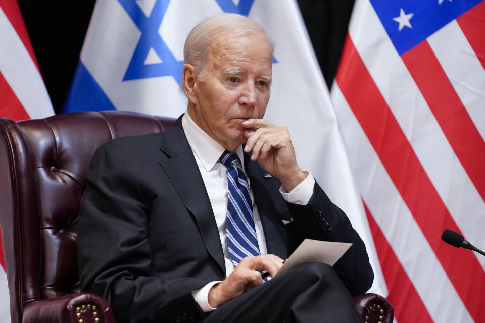 FILE - President Joe Biden listens as he and Israeli Prime Minister Benjamin Netanyahu participate in an expanded bilateral meeting with Israeli and U.S. government officials, Wednesday, Oct. 18, 2023, in Tel Aviv. (AP Photo/Evan Vucci, File)