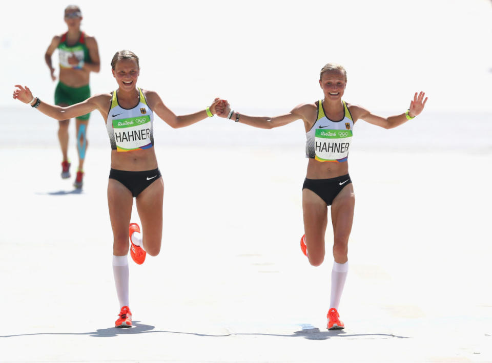 German twins Anna and Lisa Hahner celebrate as they finish the Women’s Marathon together. Somehow, this caused controversy.