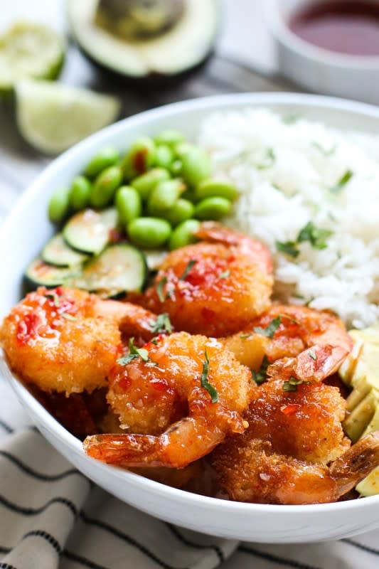 <p>Joyous Apron</p><p>Pan-fried crispy panko-breaded shrimp is combined with avocados, and fresh crunchy veggies then drizzled with Thai sweet chili sauce, which is actually sweet and not spicy. Served with white or brown rice!</p><p><strong>Get the recipe: <a href="https://www.joyousapron.com/crispy-shrimp-bowl/" rel="nofollow noopener" target="_blank" data-ylk="slk:Crispy Shrimp Rice Bowls;elm:context_link;itc:0;sec:content-canvas" class="link rapid-noclick-resp">Crispy Shrimp Rice Bowls</a></strong></p>