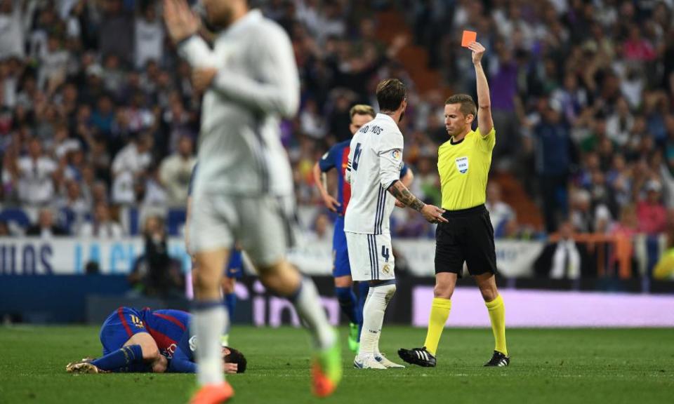 Sergio Ramos is red carded after fouling Lionel Messi