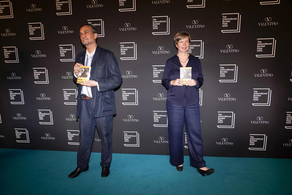 Jenny Erpenbeck, author of 'Kariros' , right, and translator Michael Hofman pose ahead of the International Booker Prize, in London, Tuesday, May 21, 2024. (AP Photo/Alberto Pezzali)