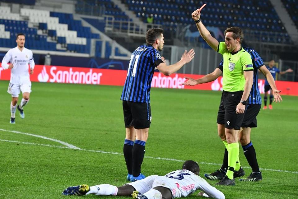 German referee Tobias Stieler gives a red card to Remo FreulerAFP