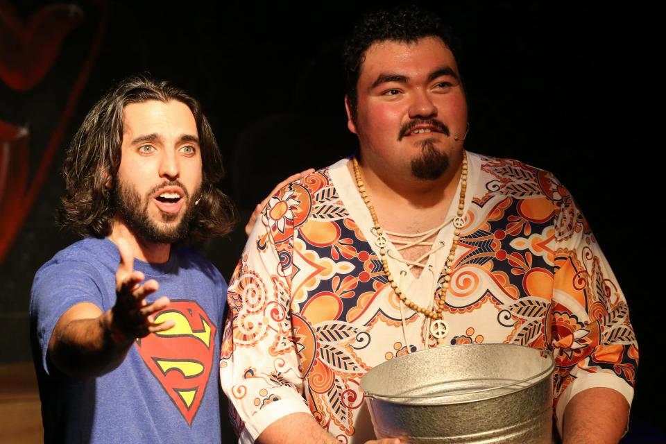 From left, Zach Campa and Jonathon Alvarez perform "Save the People" during dress rehearsal of "Godspell" at Aurora Arts Theatre Thursday, Jan. 25, 2024. Campa portrays Jesus and Alvarez plays Judas.