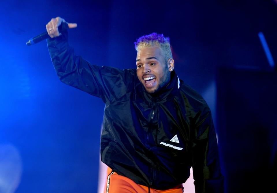 <p>Chris Brown's record is filled with <a href="https://www.rollingstone.com/music/music-lists/timeline-of-chris-browns-history-of-violence-towards-women-103402/gun-threat-august-2016-106808/" rel="nofollow noopener" target="_blank" data-ylk="slk:accusations of;elm:context_link;itc:0;sec:content-canvas" class="link ">accusations of</a> domestic violence and aggression toward women. In 2009 he attacked then-girlfriend and global pop star Rihanna. Brown eventually plead guilty to one count of felony assault, but more women have come forward with claims of violence since then. In 2016 he was arrested after a woman claimed he threatened her with a gun in his home. (Brown <a href="https://www.usatoday.com/story/life/2018/05/09/chris-brown-sued-woman-says-she-sexually-assaulted-his-home/596587002/" rel="nofollow noopener" target="_blank" data-ylk="slk:posted;elm:context_link;itc:0;sec:content-canvas" class="link ">posted</a> bail and his lawyer insisted that he had no guns at home.) In 2017 a judge granted Brown's ex-girlfriend, the actress Karrueche Tran, a restraining order after she reported claims of abuse and threats. In 2018 another woman <a href="https://www.usatoday.com/story/life/2018/05/09/chris-brown-sued-woman-says-she-sexually-assaulted-his-home/596587002/" rel="nofollow noopener" target="_blank" data-ylk="slk:sued;elm:context_link;itc:0;sec:content-canvas" class="link ">sued</a> him after she claimed he held her against her will at his home in Los Angeles house while a friend raped her. Brown has faced legal trouble for multiple other fights and violent altercations as well.</p> <p>In January 2019 a woman came forward in France and claimed that she met Brown at a nightclub there. According to the <em><a href="https://www.nytimes.com/2019/01/22/arts/music/chris-brown-rape-paris-allegation.html" rel="nofollow noopener" target="_blank" data-ylk="slk:New York Times;elm:context_link;itc:0;sec:content-canvas" class="link ">New York Times</a>,</em> the woman told police that Brown invited her and several other women to his hotel. Eventually, she found herself alone in one of Brown's rooms where, she alleges, Brown, a friend of his, and a bodyguard raped her.</p> <p><strong>His Response:</strong></p> <p>While Brown has spoken about some of the incidents he has been involved in, his label has not addressed the allegations in Paris. He took to Instagram however to respond to the woman's claims: "I WANNA MAKE IT PERFECTLY CLEAR…… THIS IS FALSE AND A WHOLE LOT OF CAP [sic]!" he <a href="https://people.com/music/chris-brown-denies-rape-accusation-custody-lifted/" rel="nofollow noopener" target="_blank" data-ylk="slk:wrote;elm:context_link;itc:0;sec:content-canvas" class="link ">wrote</a> in a post that he has since deleted. A representative <a href="https://www.huffingtonpost.com/entry/chris-brown-sues-rape-accuser_us_5c47e613e4b083c46d639ba9?ncid=tweetlnkushpmg00000067&__twitter_impression=true" rel="nofollow noopener" target="_blank" data-ylk="slk:tweeted;elm:context_link;itc:0;sec:content-canvas" class="link ">tweeted</a> that Brown was released less than 24 hours later and that he planned to sue the woman for her claims against him.</p> <p><strong>The Fallout:</strong></p> <p>Police held Brown and questioned him over the most recent accusations, but released him on January 22. The investigation into the women's claims is ongoing.</p>