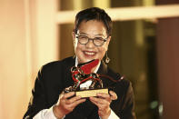 Director Ann Hui holds her Golden Lion award for Lifetime Achievement during the 77th edition of the Venice Film Festival in Venice, Italy, Tuesday, Sept. 8, 2020. (Photo by Joel C Ryan/Invision/AP)