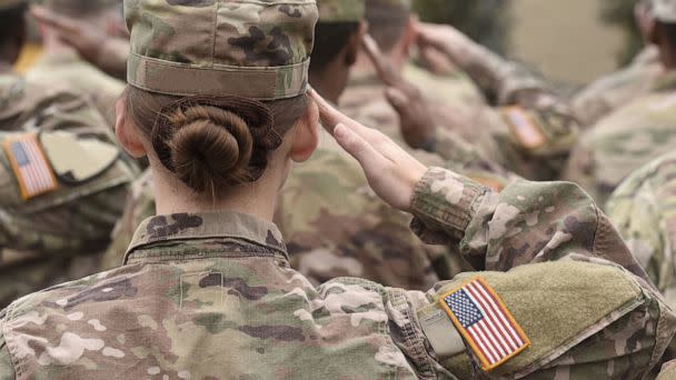 PHOTO: Female American soldiers salute in an undated stock image. (STOCK PHOTO/Bumble Dee/Shutterstock)