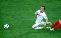 Soccer Football - World Cup - Group E - Serbia vs Switzerland - Kaliningrad Stadium, Kaliningrad, Russia - June 22, 2018 Switzerland's Xherdan Shaqiri in action with Serbia's Luka Milivojevic REUTERS/Fabrizio Bensch